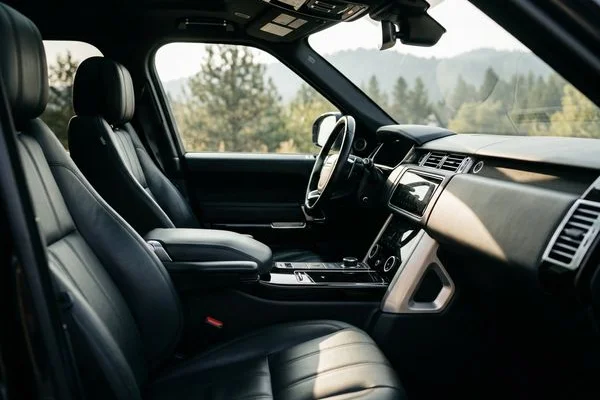 Professionally detailed vehicle interior with clean leather